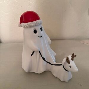 Santa ghost with “reindeer” dog